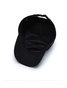 Detailed inner view of black cadet cap featuring moisture-wicking sweatband and adjustable strap
