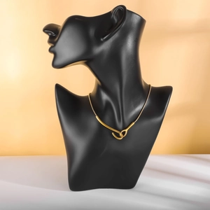 Minimalist gold snake chain necklace featuring a unique abstract knot pendant for women