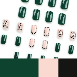 Short square press-on nails in deep green and pink leopard print glossy finish