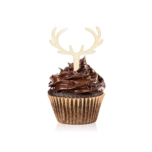 Detail of a natural wooden antler cupcake topper on a chocolate muffin