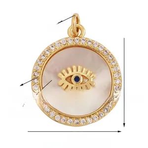 Detail of 19mm evil eye charm with natural shell and cubic zirconia showing dimensions