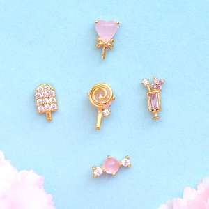 Five-piece gold stud earring set featuring pink ice cream and candy shapes with zircons