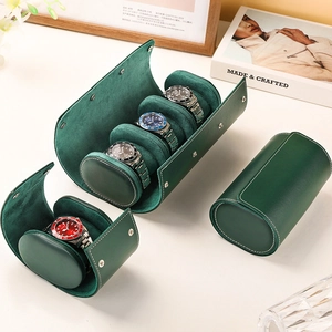 Portable dark green leather watch roll organizer with velvet lining and snap closures