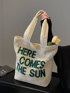 Large straw tote bag with Here Comes The Sun text for summer beach vacations