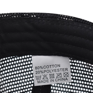 Macro view of the internal wash label showing cotton blend material on the trucker hat