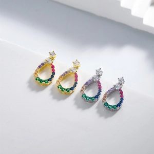 Teardrop hollow earrings set with colorful zircons in gold and silver plating
