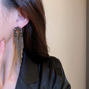 Elegant long black tassel earrings with geometric hollow base for formal evening wear