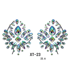 Detail of symmetrical AB crystal body jewels for festivals with colorful resin rhinestones