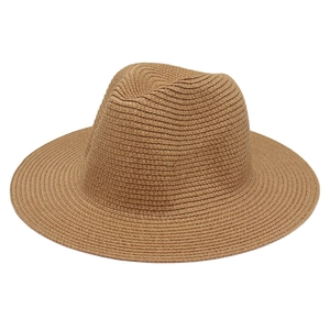 Classic wide brim Panama straw hat in tan with a pinched crown for summer sun protection