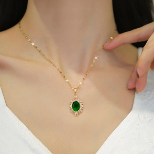 Titanium steel necklace with green oval gemstone pendant and clear zircon inlay