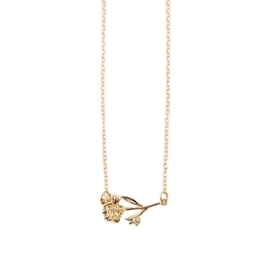 18K gold plated flower pendant necklace with delicate stem and leaf on white background
