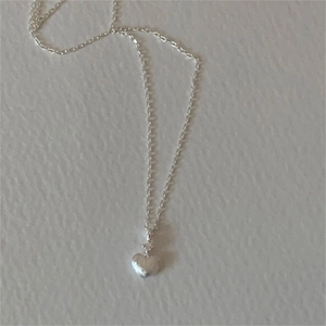 Minimalist 925 sterling silver necklace with a matte textured heart pendant for women