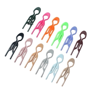 Set of 12 colorful U-shaped plastic hair pins for bun styling on white background