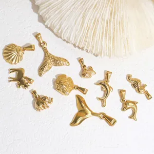 24K gold plated stainless steel ocean theme pendants featuring seahorse and dolphin motifs