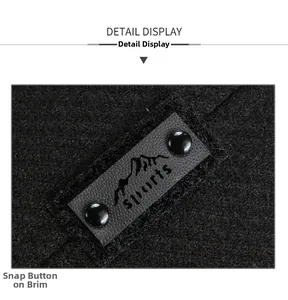 Detail view of winter baseball cap showing side snap buttons and mountain logo tag
