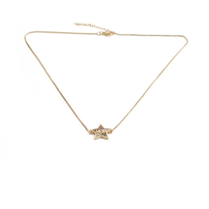 Detailed macro view of gold star pendant with MOM engraving and colored gemstones