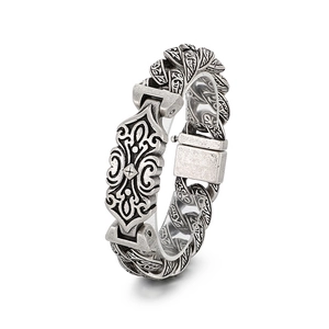 Vintage oxidized silver stainless steel men's bracelet with intricate floral relief pattern