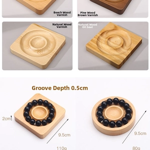 Detail of wooden bracelet display tray showing dimensions and polished beech wood texture