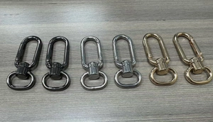 Set di 6 ganci a moschettone in metallo nero, argento e oro per borse e portachiavi
