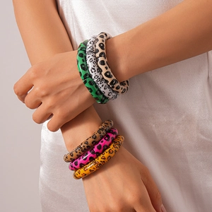 Set of colorful acrylic geometric leopard print bracelets with glossy resin finish for women