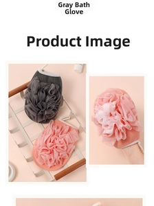 Detail view of pink and grey exfoliating bath gloves with mesh design and elastic wrists