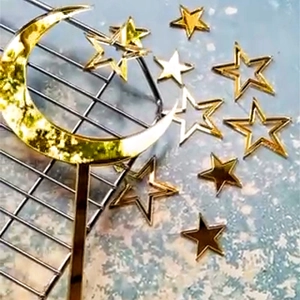 Golden acrylic moon and stars cake topper set for party and dessert decoration