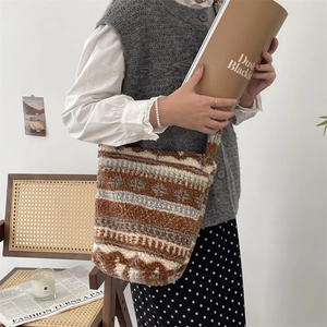 Detail of plush leopard geometric tote bag showing soft wool-like texture and pattern