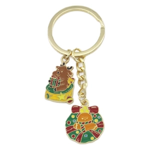 Christmas alloy keychain featuring gingerbread man with reindeer antlers and festive wreath
