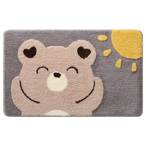 Absorbent plush bathroom mat with a cute cartoon bear and sun design on grey background