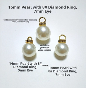 Detail view of ABS faux pearls in 14mm and 16mm sizes with golden rhinestone rings