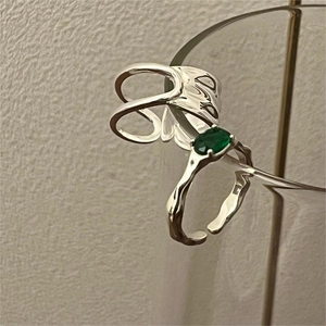 Minimalist 925 silver rings set with irregular liquid texture and green gemstone accent