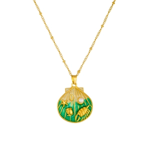 Golden stainless steel necklace with shell pendant featuring stars and turtles on white backdrop