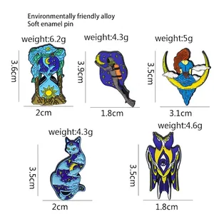 Creative enamel pins collection featuring starry sky, hourglass, and astronaut themes