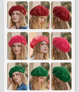 Detail view of red, magenta and green wool berets shown from multiple angles