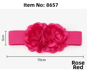 Detail of 6cm wide rose red elastic belt featuring two large handcrafted satin flowers