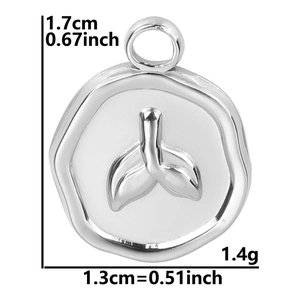 Macro detail of silver fishtail pendant with 1.7cm height and 1.3cm width dimensions