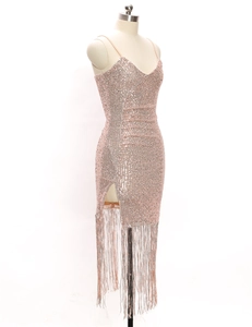Detail of rose gold sequin dress showing fine fringe hem and V-neck straps
