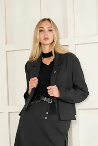 Lifestyle view of a fashion model showcasing the long minimalist multi-card wallet for women