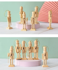 Set of unpainted wooden nutcracker ornaments with gold cords for DIY Christmas painting
