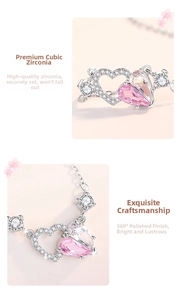 Detail of S925 silver necklace with pink heart pendant and cubic zirconia stone inlay