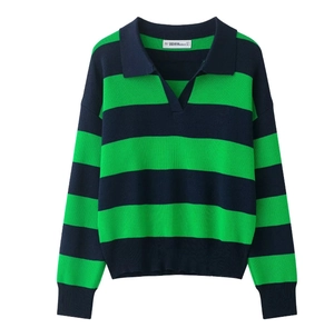 Detail of green and navy striped knit polo shirt featuring ribbed cuffs and a contrast collar