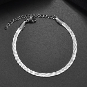 Detailed shot of silver flat snake chain bracelet with adjustable lobster clasp on black background