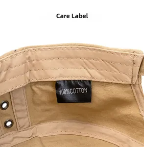 Detailed close-up of 100% cotton fabric and premium stitching on the khaki military cap