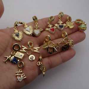 Gold heart charms and wing pendants with cubic zirconia for snake chain bracelets