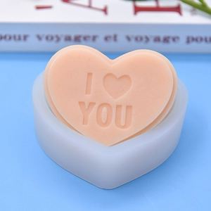 Detail of heart silicone mold with I LOVE YOU engraving for DIY cake and chocolate