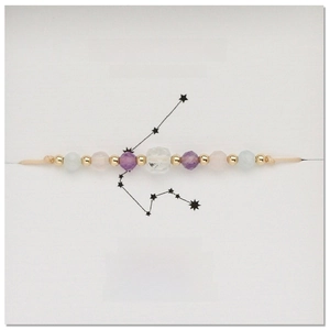 Detail van Waterman-armband met amethist, rozenkwarts en aquamarijn kralen