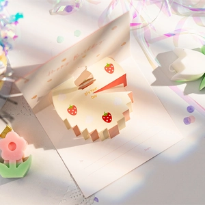 3D pop-up birthday card with a pink strawberry cake design and Happy Birthday text