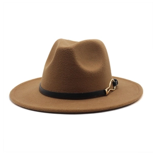 Close-up of brown wool felt fedora featuring black leather band and gold metal buckle
