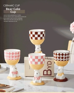 Detail of creative ceramic sundae glass with 3D bear stem and pink checkerboard pattern