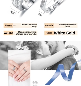 Detailed view of silver plated six-claw couple rings with cubic zirconia inlay and specs